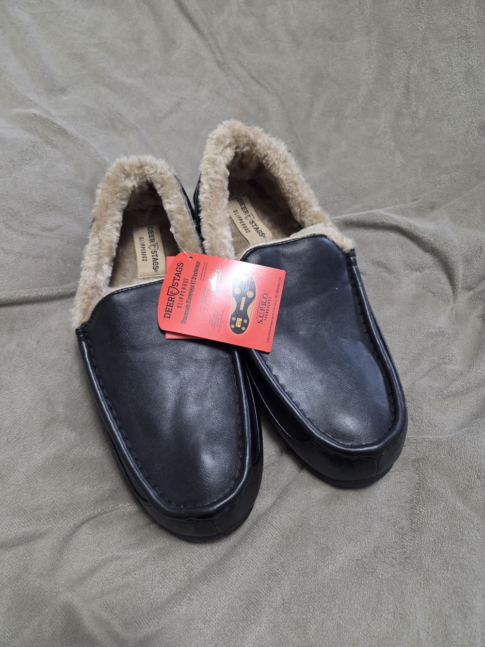 Deer Stags Men’s Black Slip-On Moccasin Slippers with Tan Lining